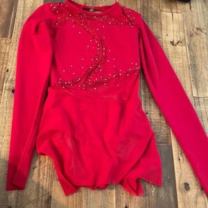 This is a red, rhinestoned, custom leotard. It’s a size adult XS.